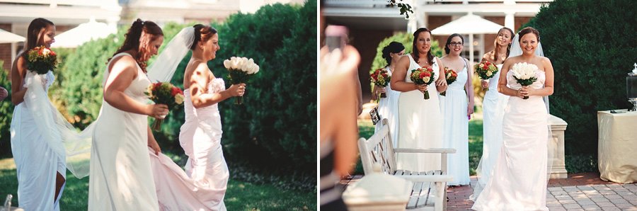 Bride with Bridesmaids walking down the isle at the Thomas Birkby House by Washington DC Wedding Photographer Sam Hurd