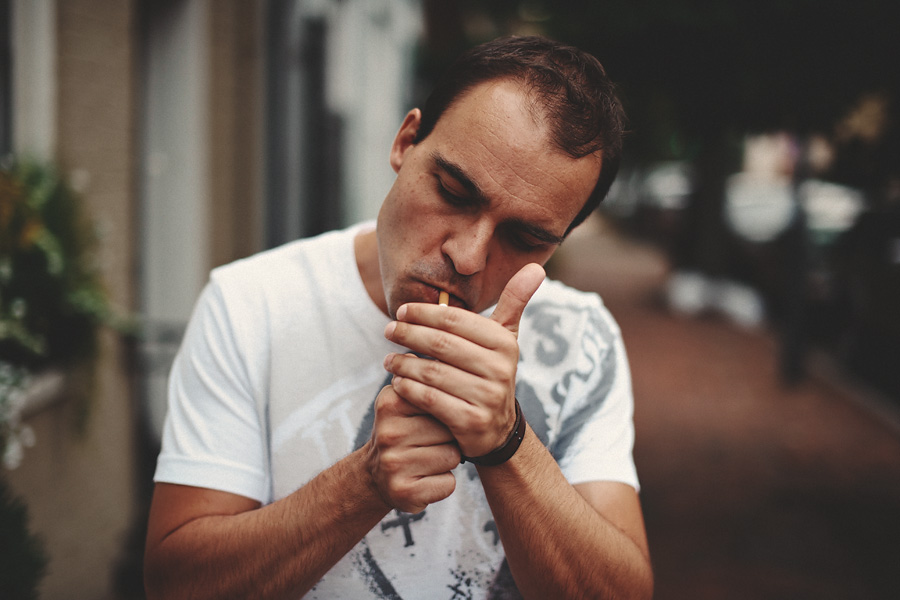northern va wedding photographer : guy lighting a cigarette :