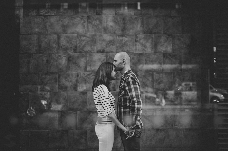 black and white of man and woman kissing