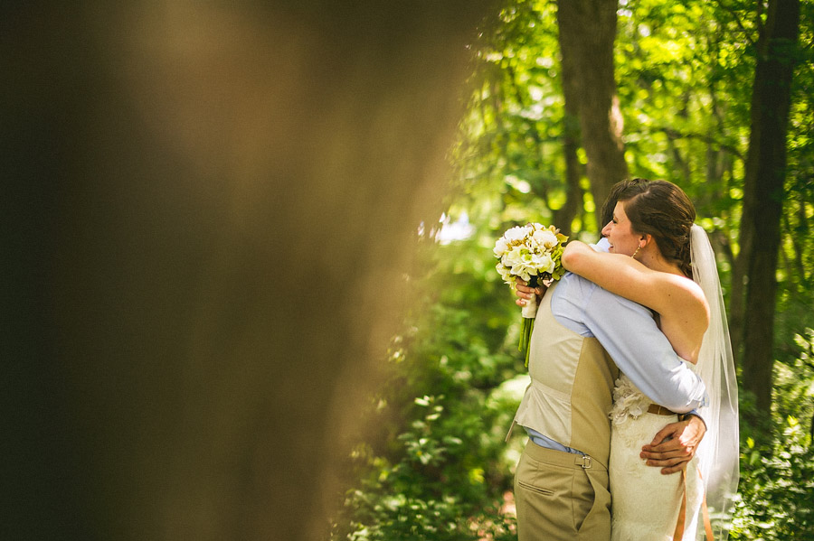 11 bride and groom hugging first look bride and groom hugging first look
