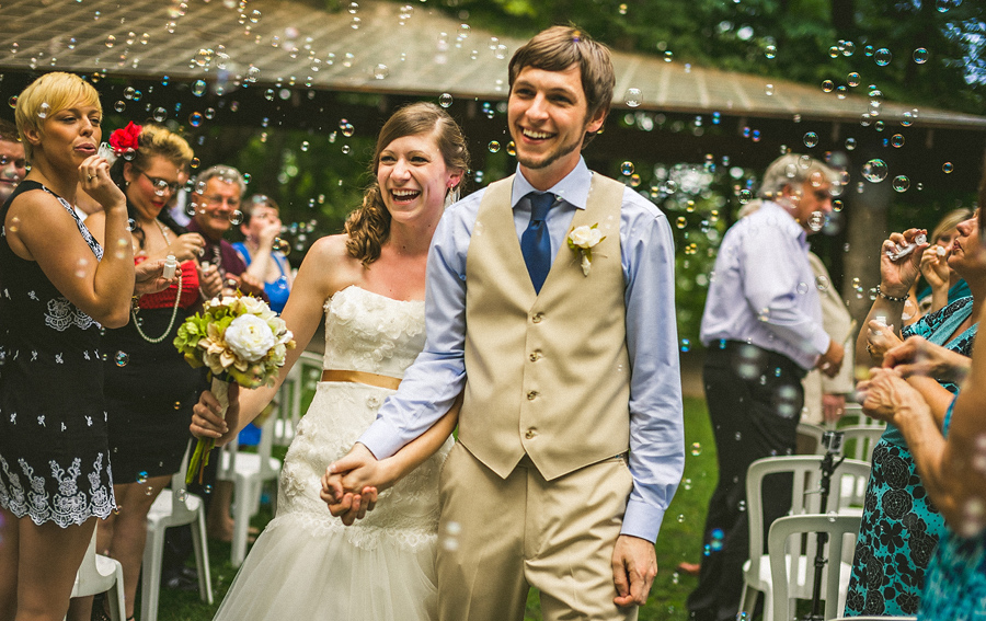 18 bride and groom leaving ceremony with bubbles bride and groom leaving ceremony with bubbles