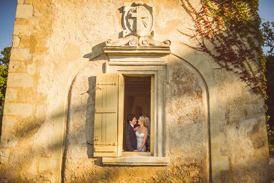 creative bride and groom portrait on french wedding venue