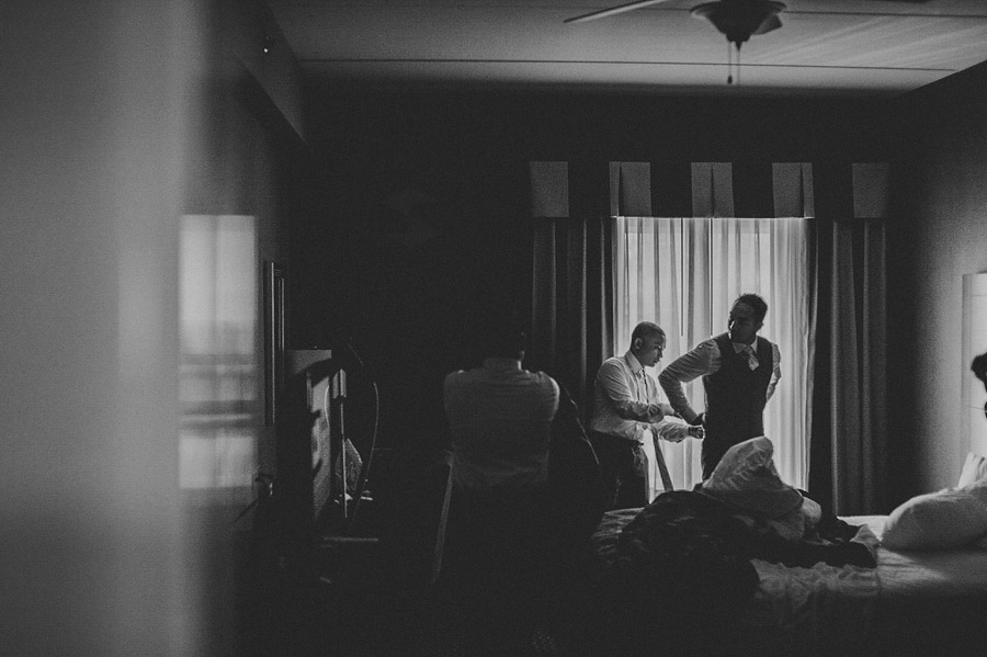 groom getting ready in hotel