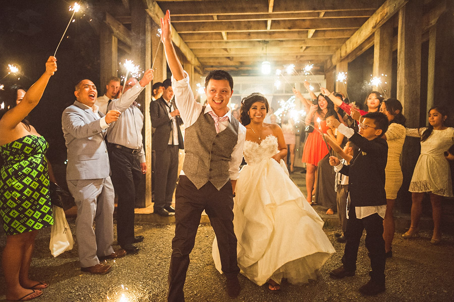 bride and groom exiting with sparklers at bluemont vineyard in virginia