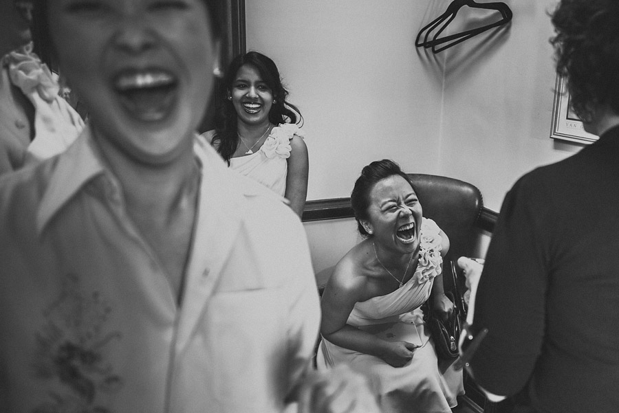 a photo of bridesmiads laughing