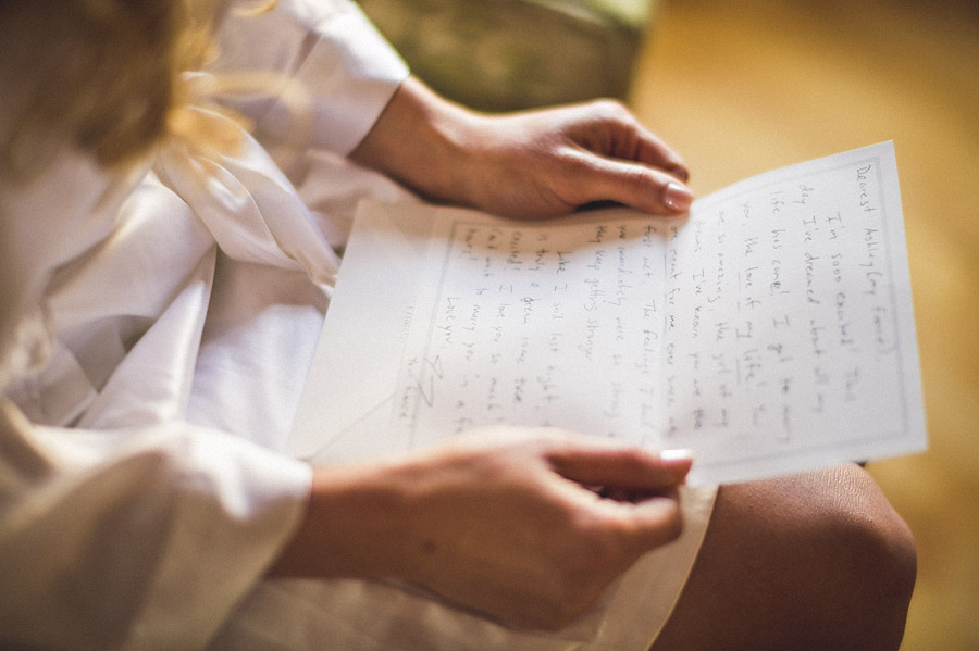 bride reading note from groom