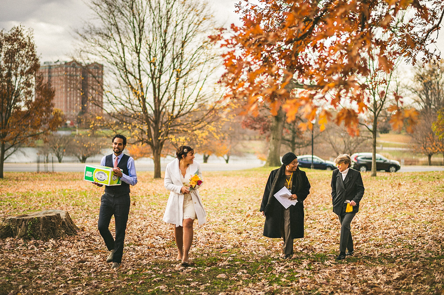 everyone walking to cut the cake