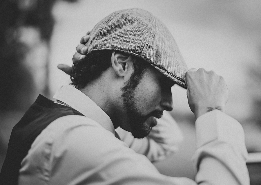 kyle fixing his hat before portrait