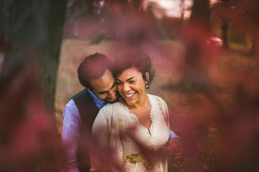 bride and groom laughing