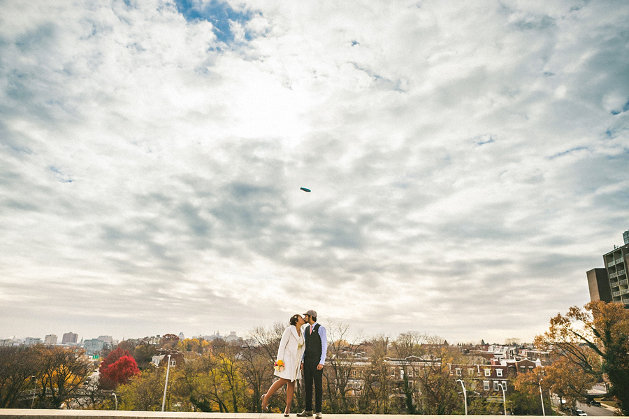 awesome photo of bride and groom on their wedding day in front of downtown baltimore maryland