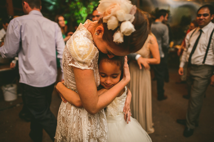 57 bride hugging flower girl bride hugging flower girl