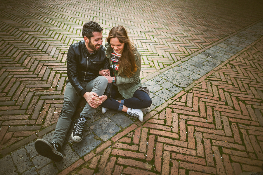 laughing couple in town square
