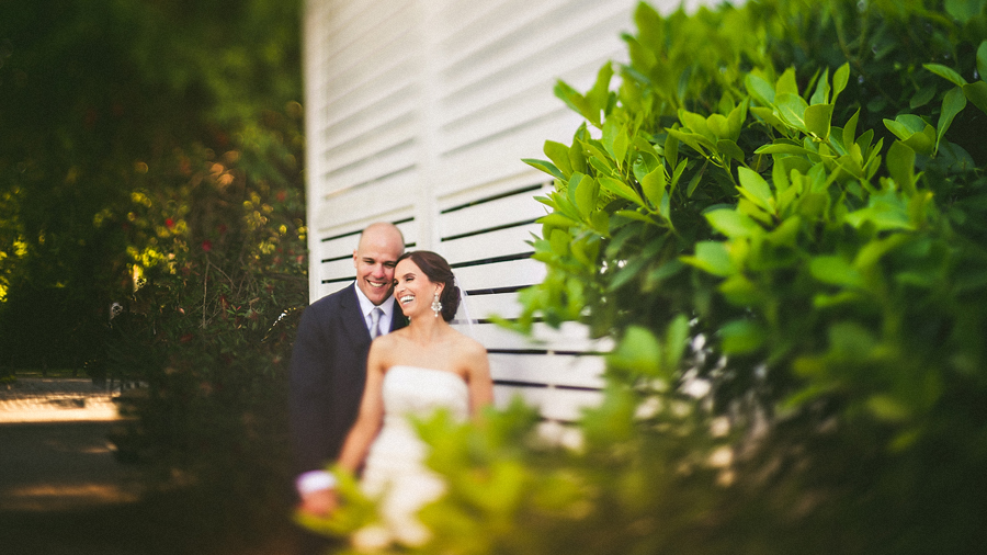 bride and groom laughing