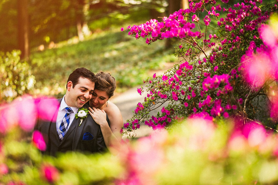 bride and groom in woods