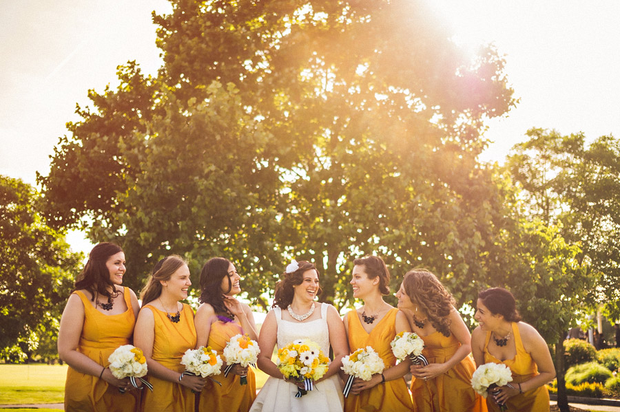 06 bride laughing with bridesmaids bride laughing with bridesmaids