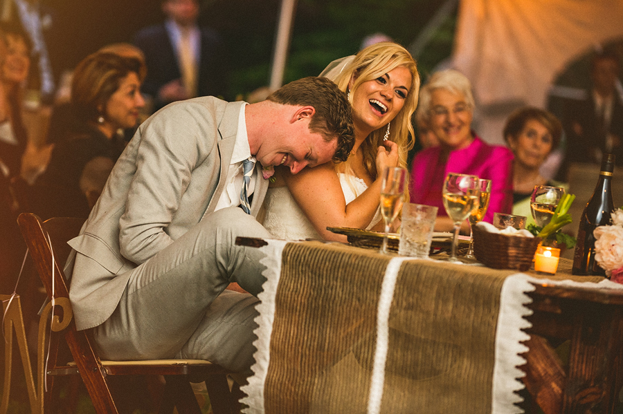 reception photos of bride and froom laughing