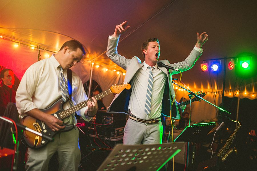 ned singing with wedding band on stage