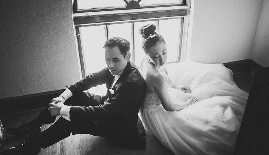 09 dramatic quiet moment of bride and groom sitting together after their wedding dramatic quiet moment of bride and groom sitting together after their wedding