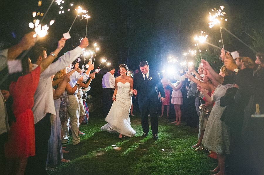 bride and groom exit with sparklers