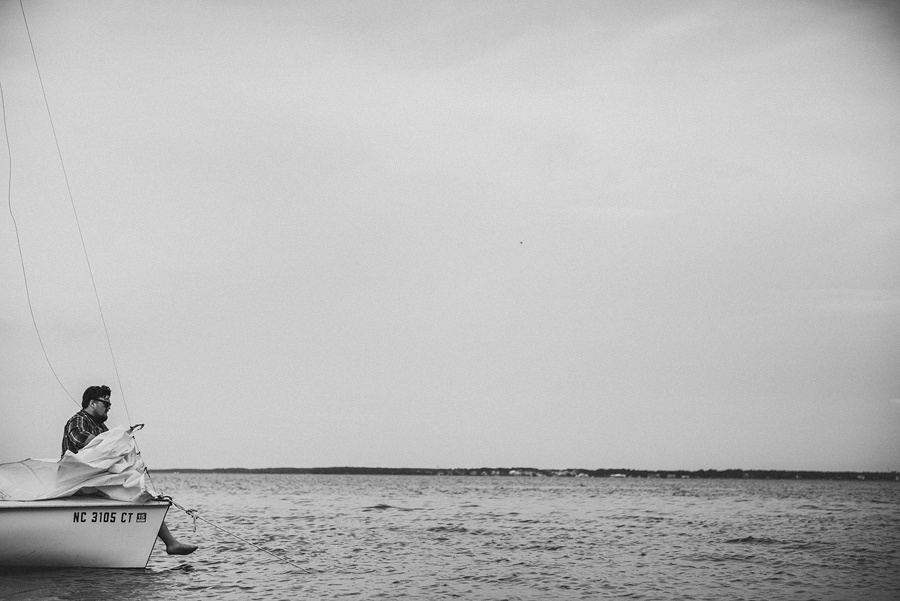 rob sitting on his sailboat
