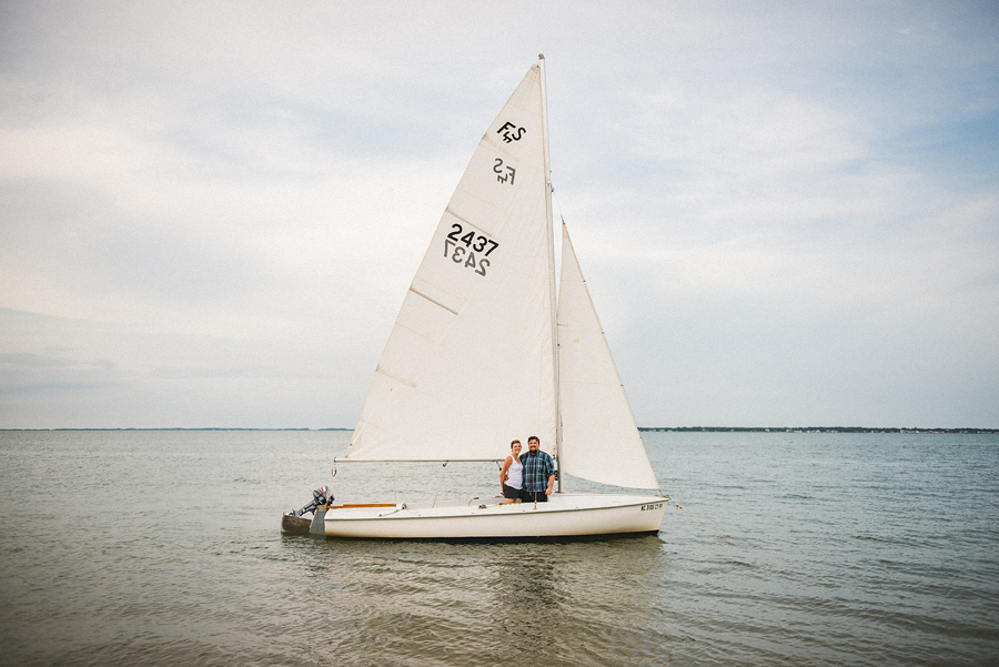 couple in their sailboat