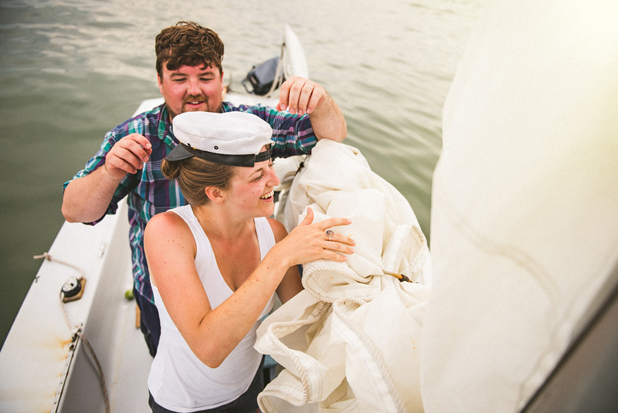 laura helping rob take down the sail
