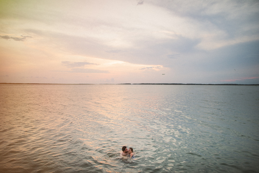 laura and rob swimming in the ocean