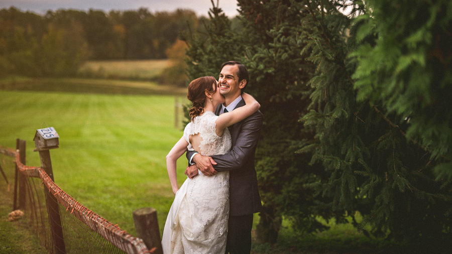 candid moment with bride and groom