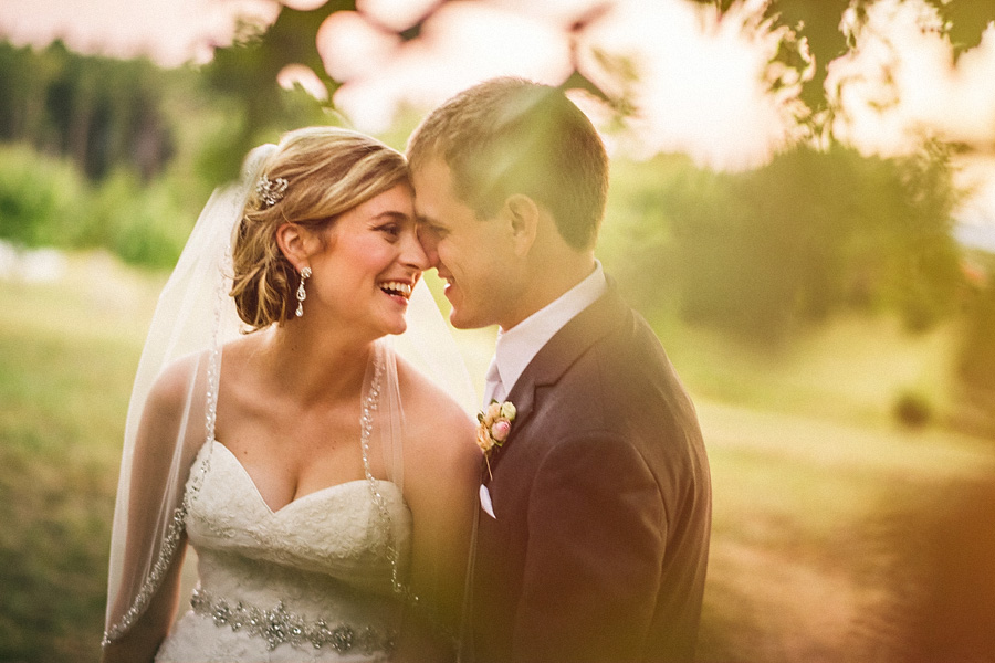 bride and groom laughing together candid at veritas winery