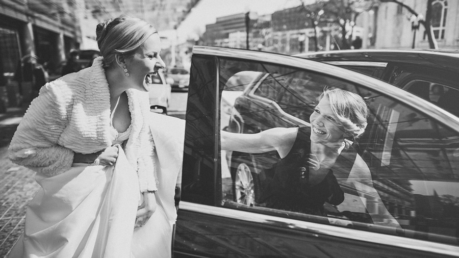 candid moment with bride getting into car in washington dc