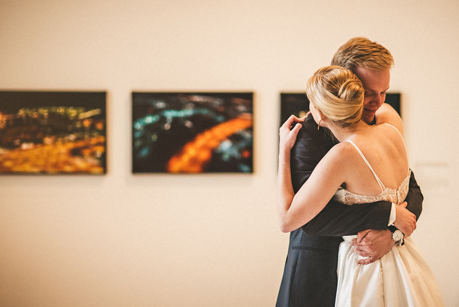 groom hugging during first look