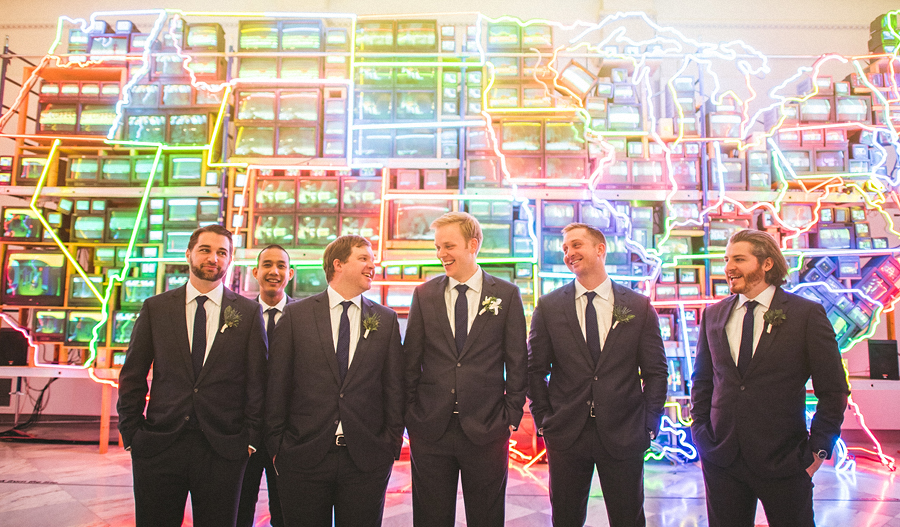 groom laughing with groomsmen