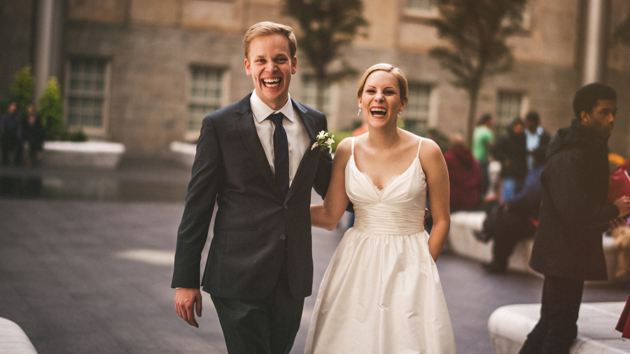 candid moment with bride and groom