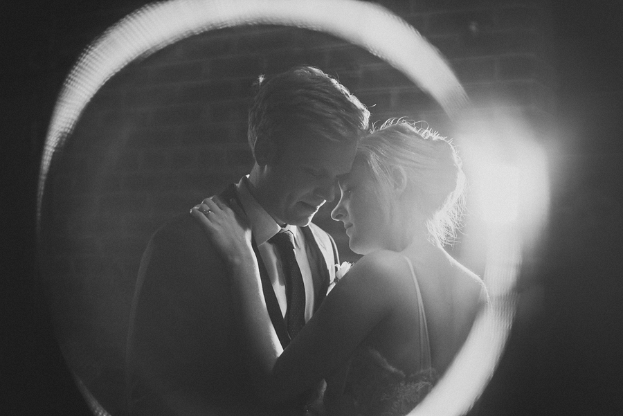 creative portrait of bride and groom at longview gallery on their wedding day