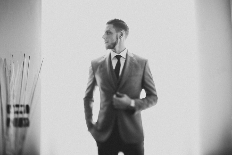 portrait of a groom in his home