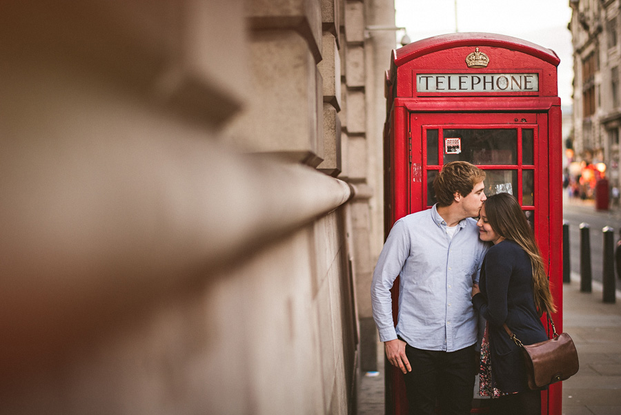 london british telephone box with engagement photos