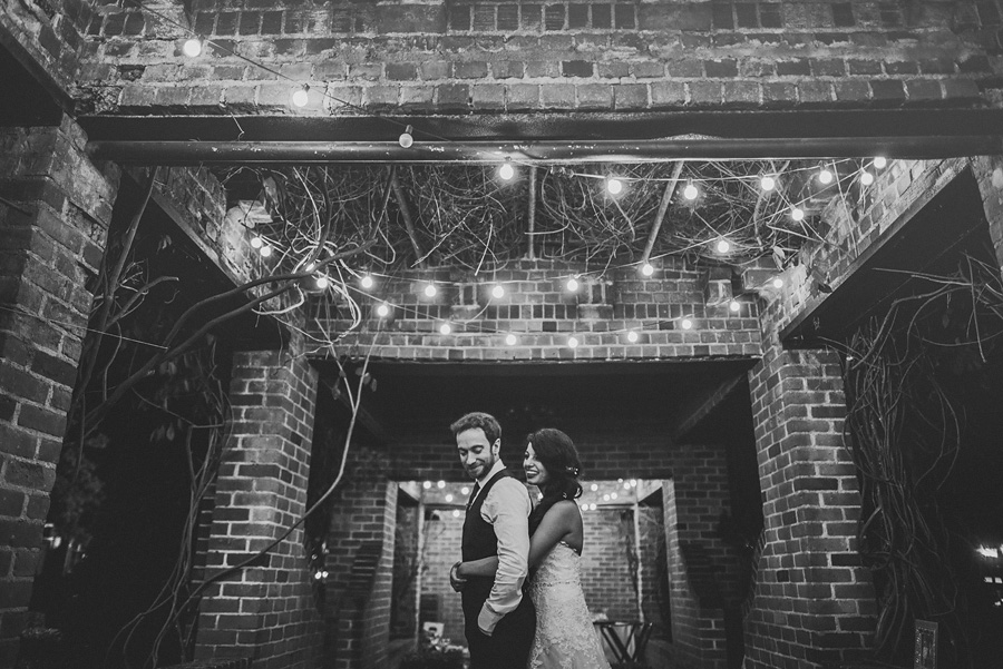 night photo of bride and groom