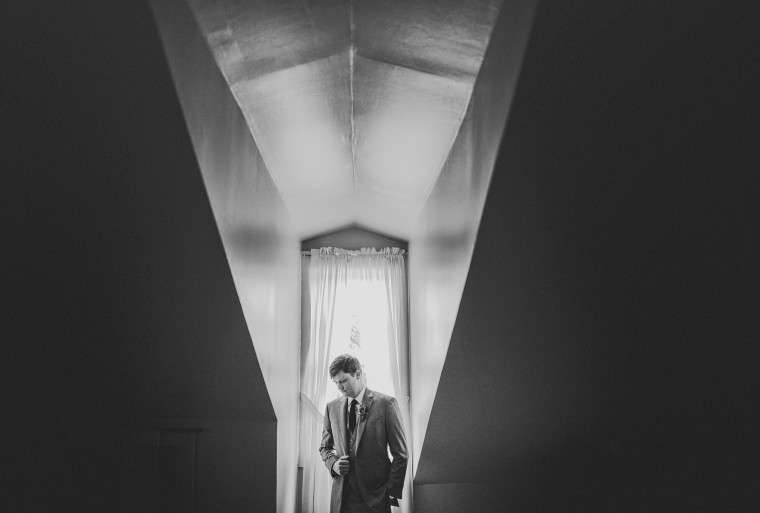 03 groom getting ready at race and religious wedding