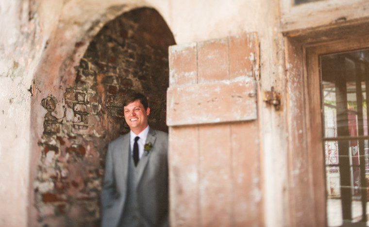05 tilt shift portrait of groom at race and religious wedding