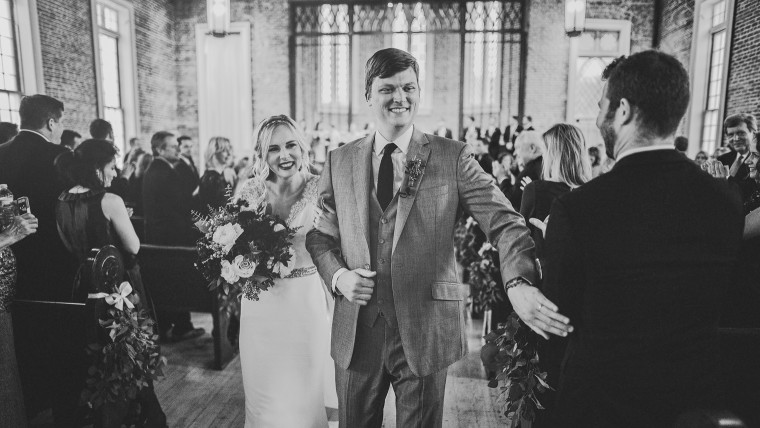 11 bride and groom exiting church ceremony after wedding