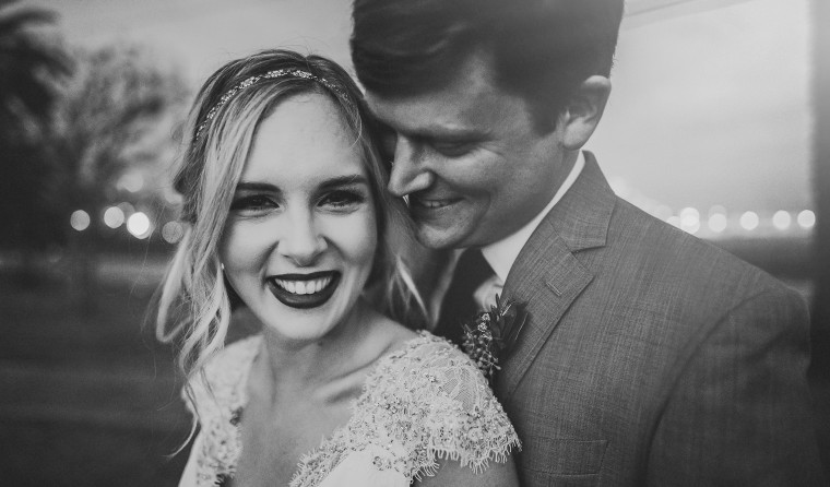16 bride and groom laughing together