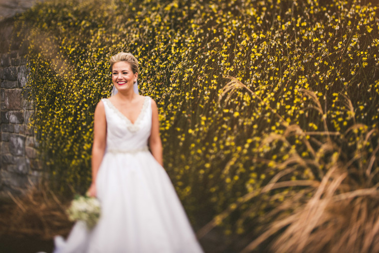 02 tilt shift of laura the bride having a candid moment