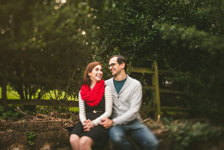 05 couple sitting down and laughing together
