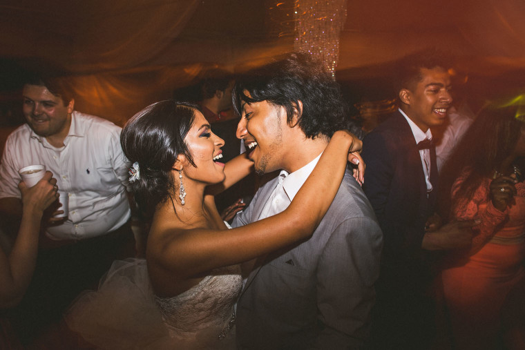 02 bride and groom dancing and laughing