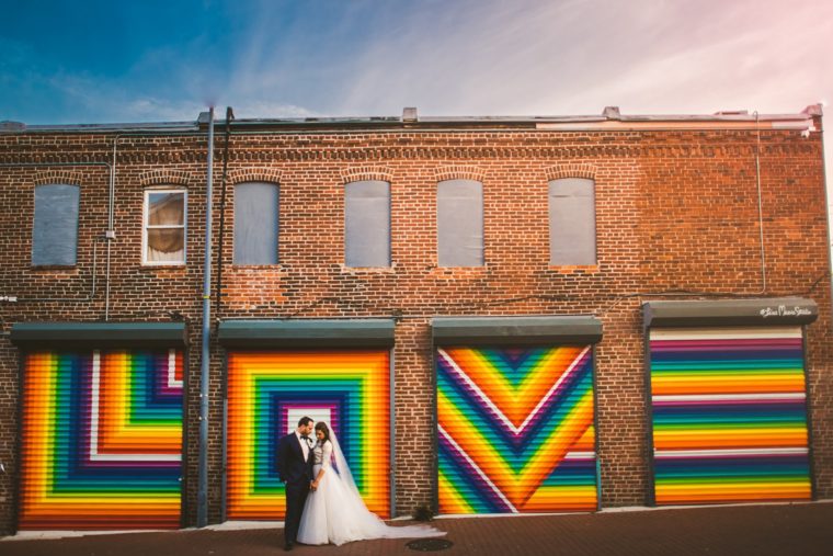 love mural in dc with wedding couple