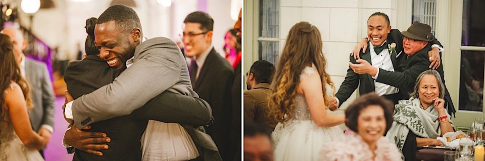 Two scenes at a boathouse wedding reception: on the left, two men embracing joyfully; on the right, guests laughing and cheering at a table.