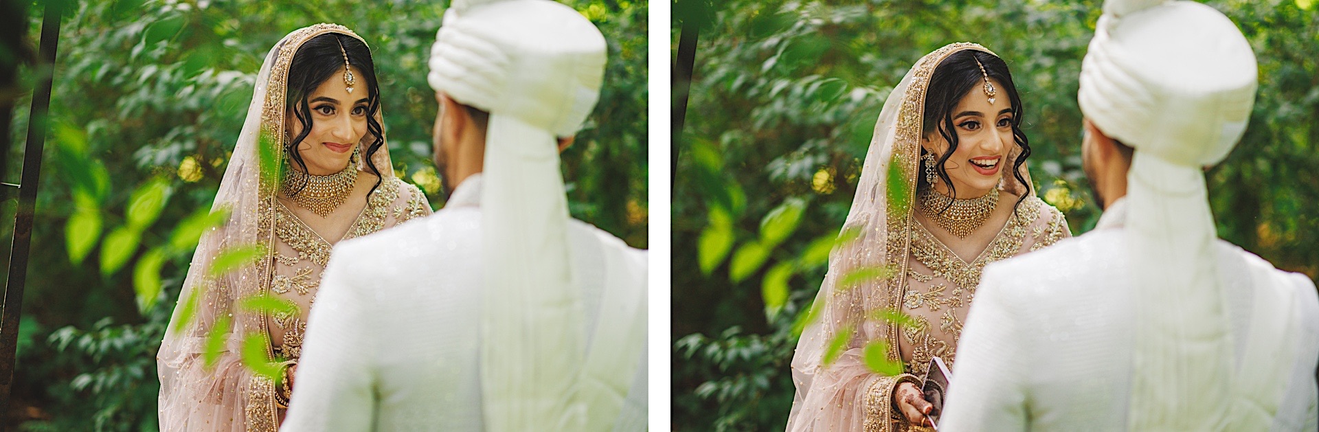 A bride in traditional attire smiles while looking at a groom dressed in white, as if the moment were an auto draft of everlasting love. They are both outdoors with greenery in the background.