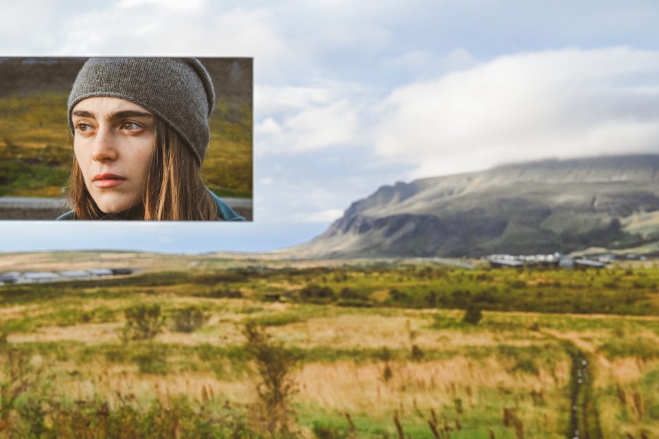 A young person in a beanie looking serious is inset over a vast open landscape with a mountain and cloudy sky, capturing the scene's essence as if it were lifted straight from a Nikon Z8 review.